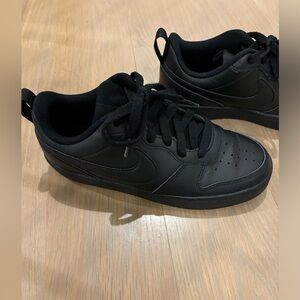 Big kid black Nike sneakers 5.5